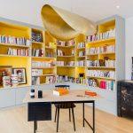 Stunning-pendant-in-gold-along-with-fabulous-yellow-shelves-enliven-this-home-office-60144